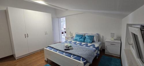 Postel nebo postele na pokoji v ubytování Apartman Grošić