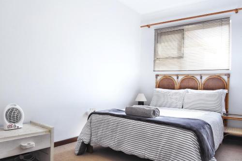 Katil atau katil-katil dalam bilik di Beachfront Selfcatering