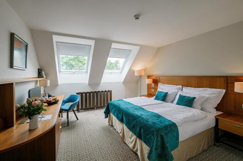 Postel nebo postele na pokoji v ubytování Hotel Silenzio