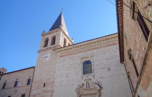 a building with a clock tower on top of it at Stunning Home In Spello With Wifi in Spello