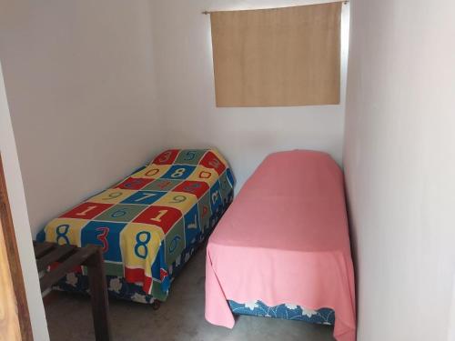 Ένα ή περισσότερα κρεβάτια σε δωμάτιο στο Lo De Maria Adela