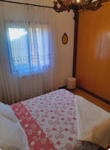 Postel nebo postele na pokoji v ubytování Praia Espinho