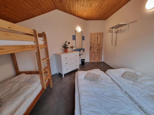 Postel nebo postele na pokoji v ubytování Penzion Askaha