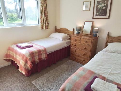 Ένα ή περισσότερα κρεβάτια σε δωμάτιο στο Kingfisher Cottage Newcastle Emlyn