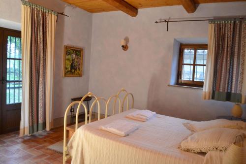 Ένα ή περισσότερα κρεβάτια σε δωμάτιο στο Appartamento Poggiolo, Wifi, Near Perugia