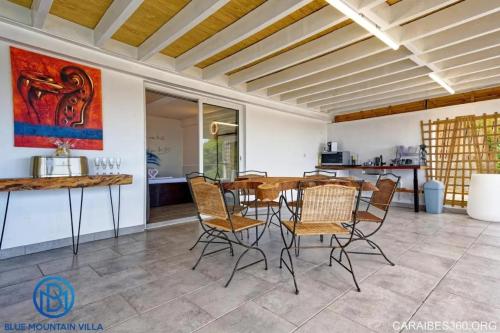 Φωτογραφία από το άλμπουμ του Villa élégante avec vue sur mer et montagne au Carbet σε Λε Καρμπέ