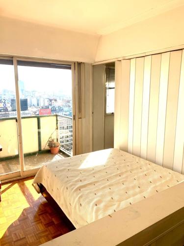 Ένα ή περισσότερα κρεβάτια σε δωμάτιο στο Monoambiente Microcentro Capital Federal Bs As 201