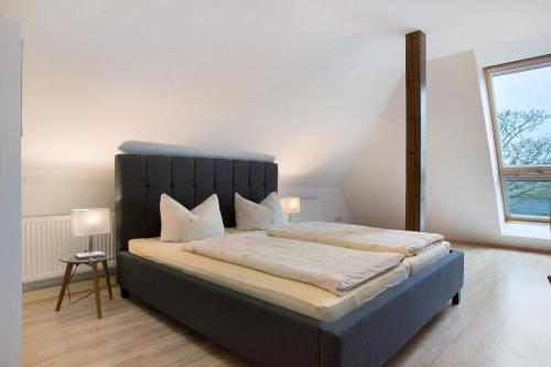 Ένα ή περισσότερα κρεβάτια σε δωμάτιο στο Herrenhaus Talevski