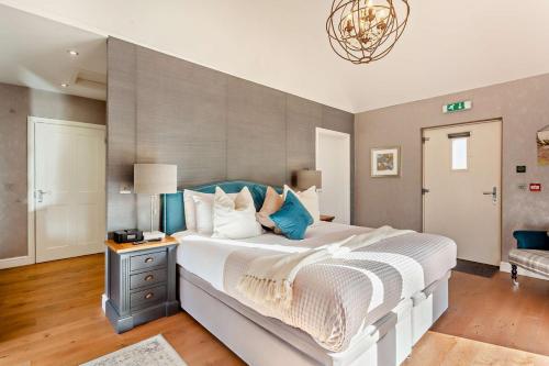 Ένα ή περισσότερα κρεβάτια σε δωμάτιο στο Glenmore Lodge