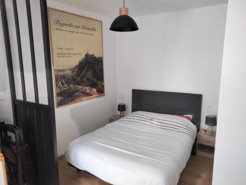 Ένα ή περισσότερα κρεβάτια σε δωμάτιο στο Superbe appartement