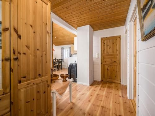 a room with wooden walls and a wooden floor at Chalet Hagehytta by Interhome in Utvik