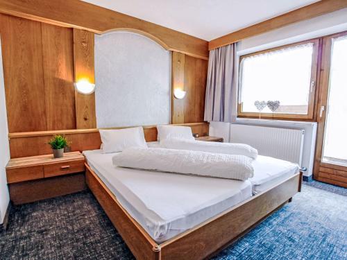 Postel nebo postele na pokoji v ubytování Apartment Einzimmer by Interhome