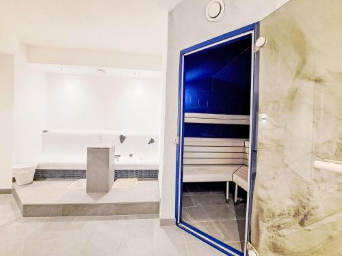 a bathroom with a shower and a toilet at Apartment Dreizimmer- by Interhome in Feichten