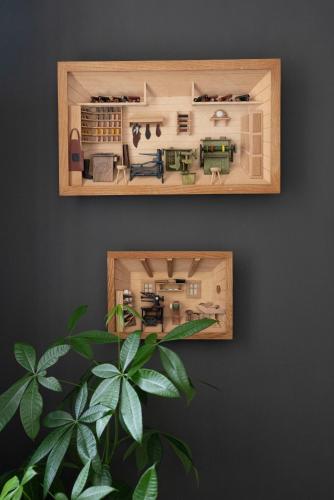 a model of a living room with a plant at Orsa Maggiore Rifugio in Campoli Appennino
