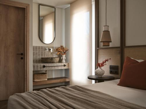 Voodi või voodid majutusasutuse Cactus Hotel toas