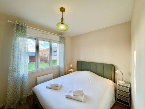 Postel nebo postele na pokoji v ubytování La Maison des Vignes de Cernay