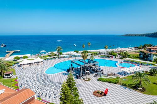 an overhead view of a swimming pool at a resort at Club Marco Polo - Premium All Inclusive in Kemer