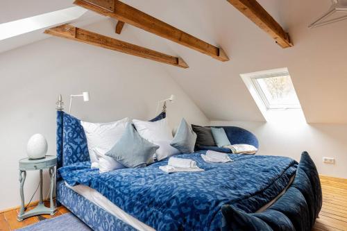 Postel nebo postele na pokoji v ubytování Das blaue Haus allein für Dich!