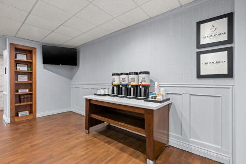a room with a table with bottles on it at Hampton Inn Bordentown in Bordentown