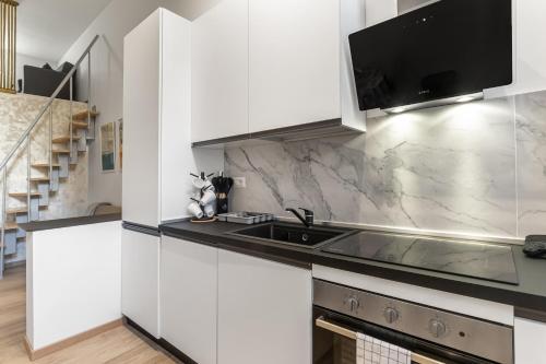 GuestHost - Ca' Granda M5 & Bicocca Apartment