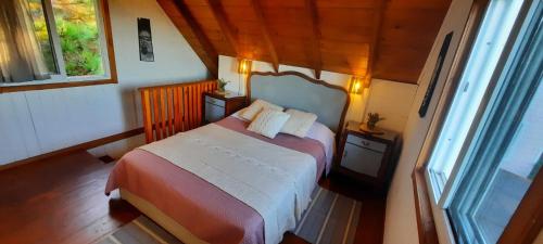 Ένα ή περισσότερα κρεβάτια σε δωμάτιο στο Chalet Provenzal