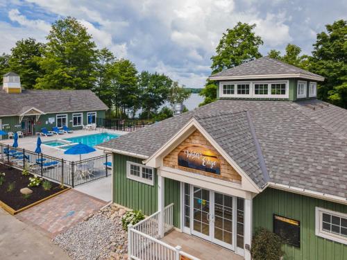 an aerial view of a house with a swimming pool at The Lynx - 35 Butternut in Cherry Valley