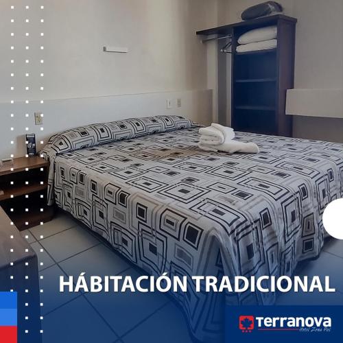 Postel nebo postele na pokoji v ubytování Hotel Terranova