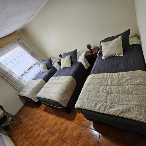 Hotel Cristobal Colonにあるベッド