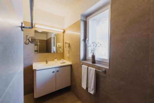 Kuchyň nebo kuchyňský kout v ubytování Appartements Elke