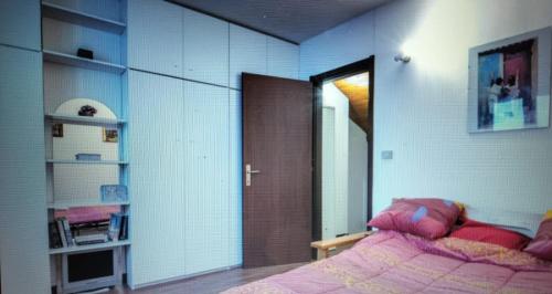 Postel nebo postele na pokoji v ubytování casa vacanze Mario