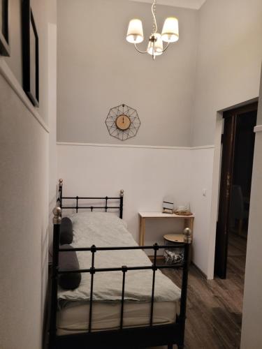 Ένα ή περισσότερα κρεβάτια σε δωμάτιο στο Apartament ToTu