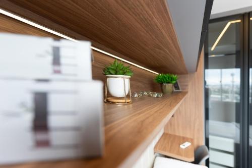 a kitchen counter with potted plants on it at Apartamento alto padrão, Arena MRV, 2 quartos, garagem in Belo Horizonte