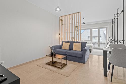 Ruang duduk di Studio in city center 15min from airport