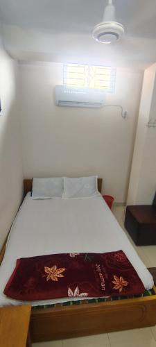 Postel nebo postele na pokoji v ubytování Hotel Inn Chittagong