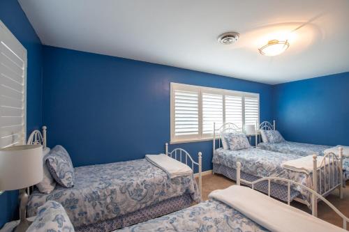 Postel nebo postele na pokoji v ubytování Serenity house villa