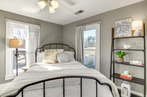 a bedroom with a bed and a window at 15 Mi to Dtwn Lexington Serene Wilmore Home! in Wilmore