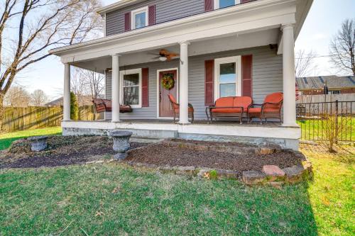a house with two chairs on the front porch at 15 Mi to Dtwn Lexington Serene Wilmore Home! in Wilmore