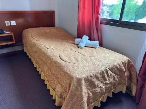 Postel nebo postele na pokoji v ubytování Sun-Shine Hotel