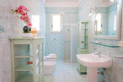 Koupelna v ubytování VILLA SABBIA D'ORO Torre Pali