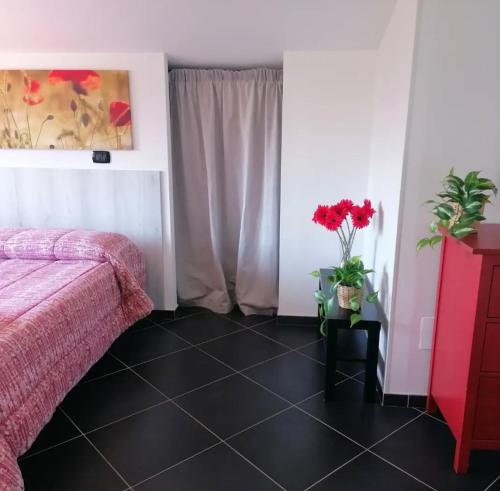 Ένα ή περισσότερα κρεβάτια σε δωμάτιο στο B&B Villa Molinari Restaurant e Baby Park