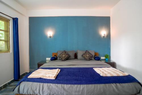 Postel nebo postele na pokoji v ubytování Janets & Johns Beach Resort since 1989