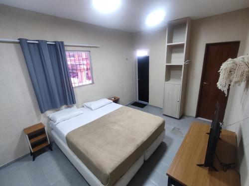 Postel nebo postele na pokoji v ubytování GVR Praia Hostel