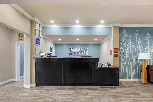 a lobby of a hospital with a reception desk at Sleep Inn & Suites Huntsville near US Space & Rocket Center in Huntsville
