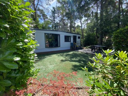Κήπος έξω από το Gezellig chalet op de Veluwe