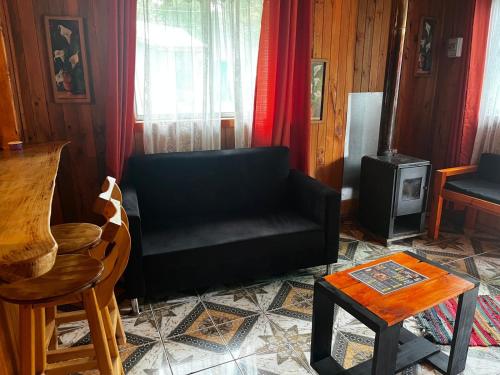Χώρος καθιστικού στο Cabañas El Rincón Del Mirador C2