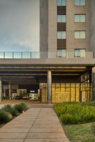 a building with a walkway in front of it at Palazzo Torquetti in Belo Horizonte