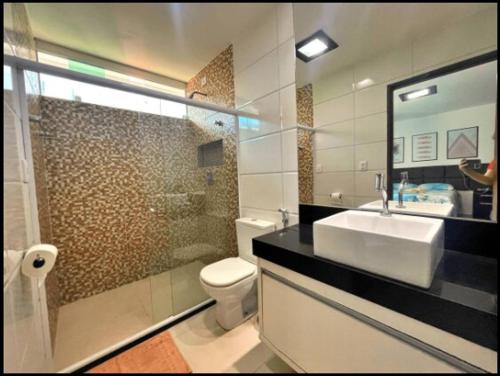 Ein Badezimmer in der Unterkunft Casa Grande Angra de Ipioca