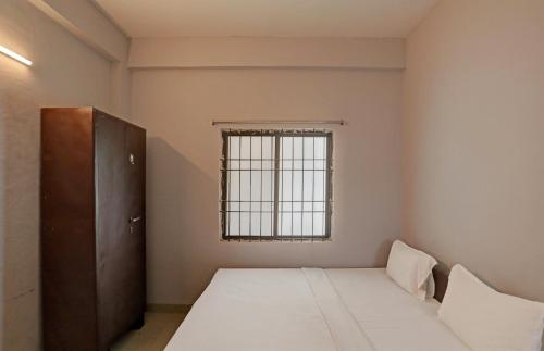 Hotel Sambodhi Palaceにあるベッド