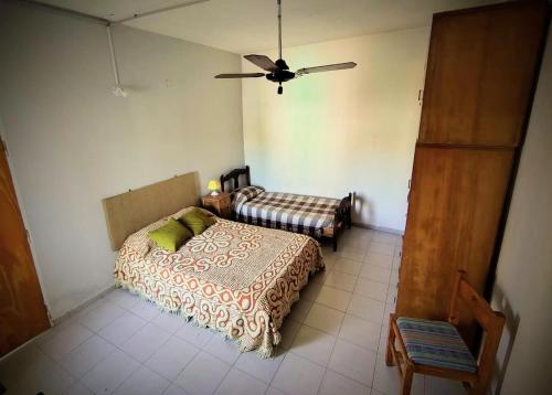 Ένα ή περισσότερα κρεβάτια σε δωμάτιο στο Casita Festiva