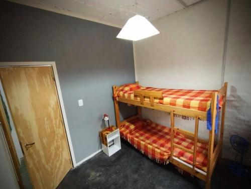 Ένα ή περισσότερα κρεβάτια σε δωμάτιο στο Casita Festiva